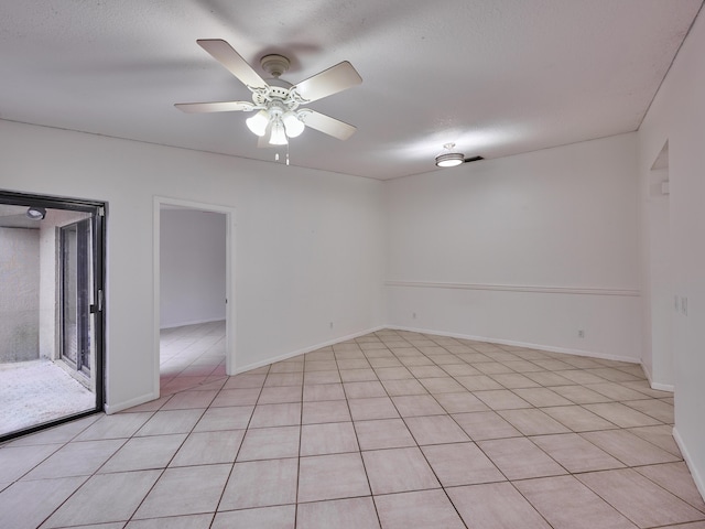 151 Meadows Dr, Boynton Beach, FL 33436 - empty room with ceiling fan, baseboards, and light tile patterned flooring