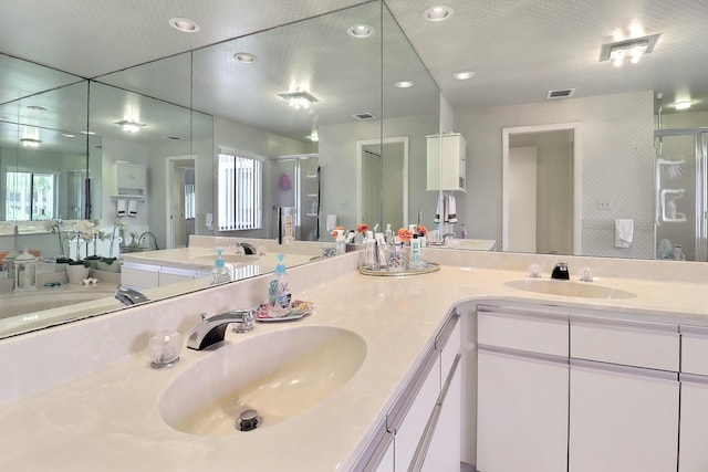 5218 Fountains Dr S Unit 206, Lake Worth, FL 33467 - bathroom featuring a stall shower, recessed lighting, and double vanity