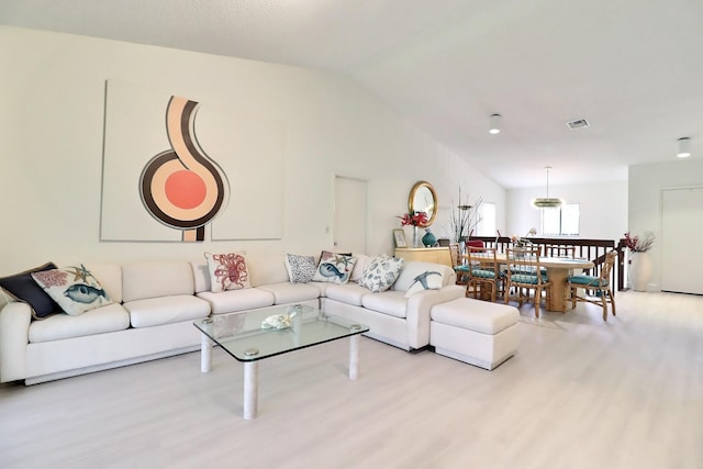 5218 Fountains Dr S Unit 206, Lake Worth, FL 33467 - living room featuring vaulted ceiling and wood finished floors