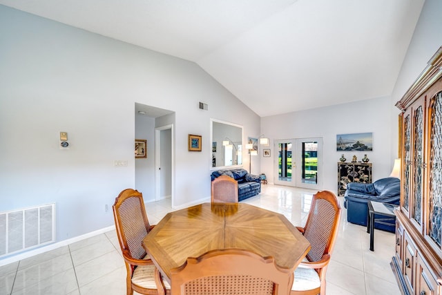 8735 Boca Glades Blvd W Unit D, Boca Raton, FL 33434 - dining area featuring light tile patterned floors, french doors, high vaulted ceiling, and baseboards