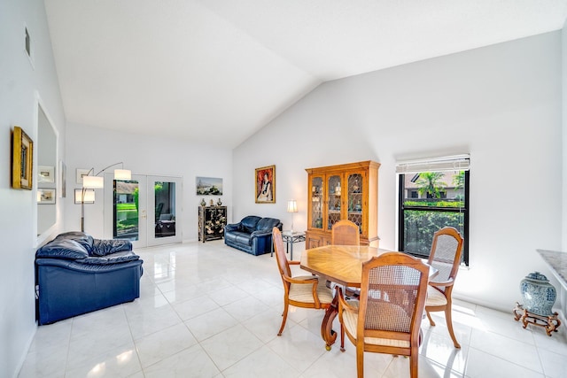 8735 Boca Glades Blvd W Unit D, Boca Raton, FL 33434 - dining area featuring vaulted ceiling, french doors, and light tile patterned floors
