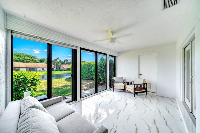 8735 Boca Glades Blvd W Unit D, Boca Raton, FL 33434 - sunroom with ceiling fan and a water view