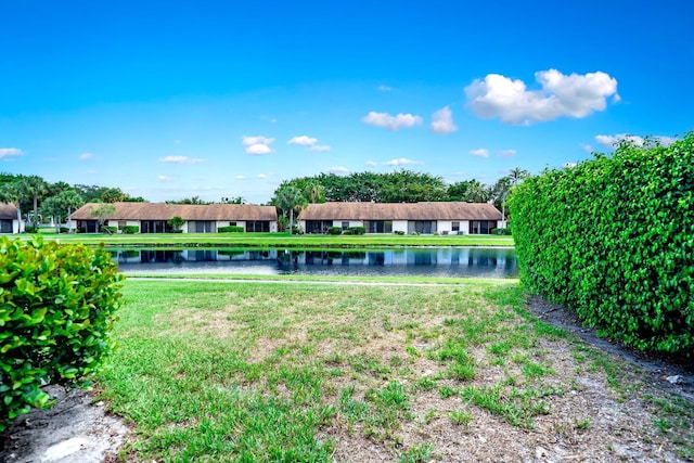 8735 Boca Glades Blvd W Unit D, Boca Raton, FL 33434 - rear view of property with a water view
