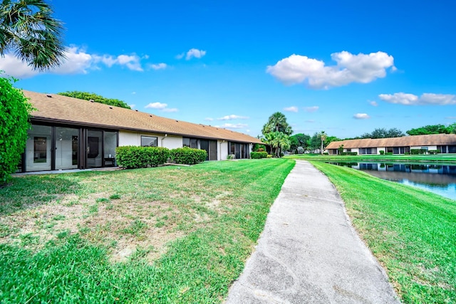 8735 Boca Glades Blvd W Unit D, Boca Raton, FL 33434 - view of grassy yard with a water view