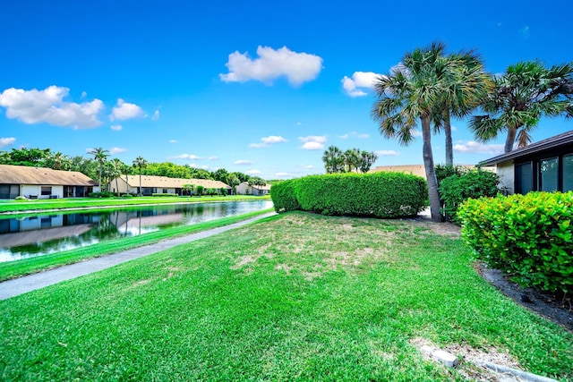 8735 Boca Glades Blvd W Unit D, Boca Raton, FL 33434 - view of grassy yard featuring a water view