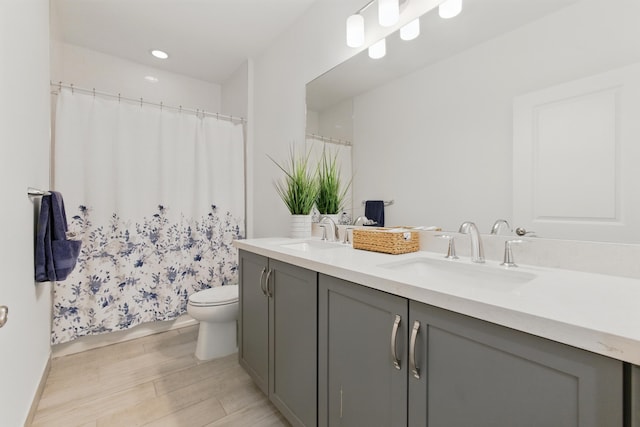622 Parsons Way, Deerfield Beach, FL 33442 - full bath featuring wood finished floors, double vanity, toilet, and curtained shower