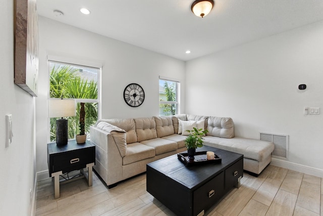 622 Parsons Way, Deerfield Beach, FL 33442 - living area with plenty of natural light, light wood-style floors, recessed lighting, and baseboards