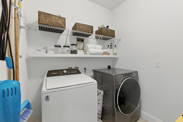 622 Parsons Way, Deerfield Beach, FL 33442 - laundry area featuring washer and clothes dryer and baseboards