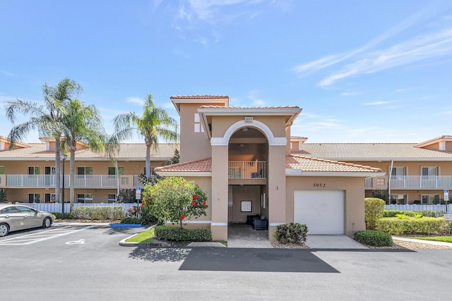5952 Regal Glen Dr Unit 204, Boynton Beach, FL 33437 - view of building exterior featuring uncovered parking
