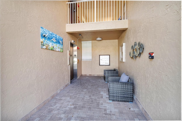 5952 Regal Glen Dr Unit 204, Boynton Beach, FL 33437 - view of patio with elevator