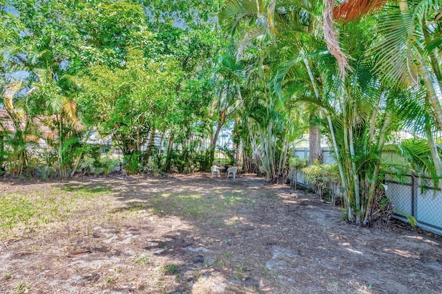 view of yard featuring fence