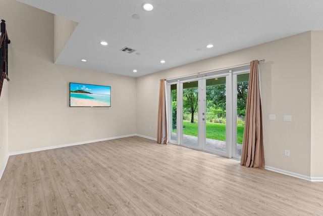 9226 Dupont Pl, Wellington, FL 33414 - spare room featuring light wood finished floors, baseboards, and recessed lighting