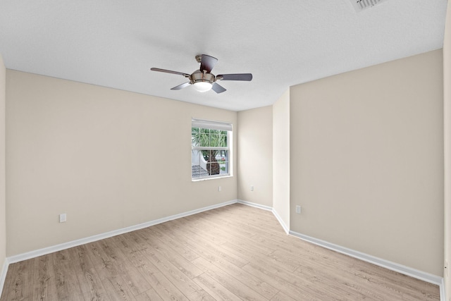 9226 Dupont Pl, Wellington, FL 33414 - empty room featuring light wood finished floors, ceiling fan, and baseboards