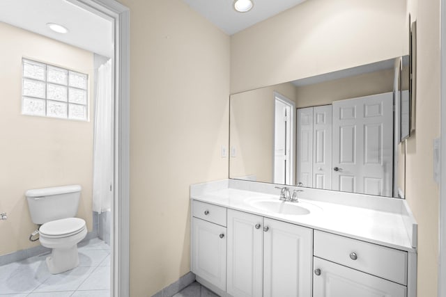 9226 Dupont Pl, Wellington, FL 33414 - full bathroom featuring vanity, baseboards, toilet, tile patterned floors, and a shower with shower curtain