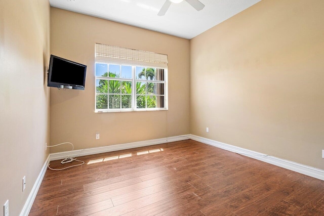 10887 Summerville Way, Boynton Beach, FL 33437 - spare room with a ceiling fan, wood finished floors, and baseboards
