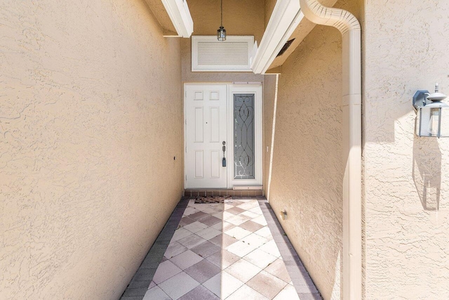 10887 Summerville Way, Boynton Beach, FL 33437 - view of exterior entry with stucco siding