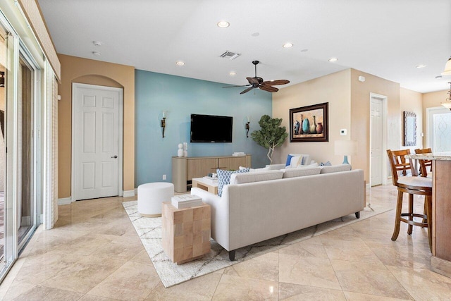 10887 Summerville Way, Boynton Beach, FL 33437 - living area with recessed lighting, a ceiling fan, arched walkways, and baseboards