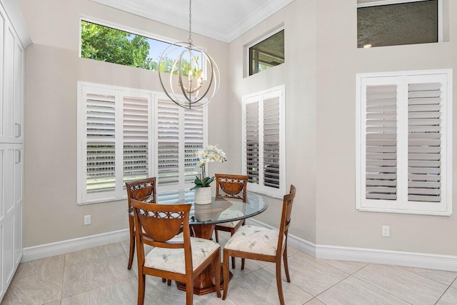 9037 Golden Mountain Cir, Boynton Beach, FL 33473 - dining area featuring a chandelier, baseboards, and ornamental molding