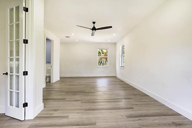 2510 Lake Dr N, Boynton Beach, FL 33435 - empty room with ceiling fan, wood finished floors, recessed lighting, and baseboards