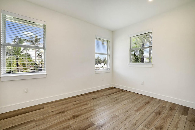 2510 Lake Dr N, Boynton Beach, FL 33435 - empty room with baseboards and wood finished floors