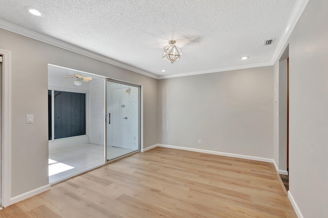 10095 45th Ter S Unit 443, Boynton Beach, FL 33436 - unfurnished bedroom featuring ornamental molding, wood finished floors, a textured ceiling, recessed lighting, and a closet