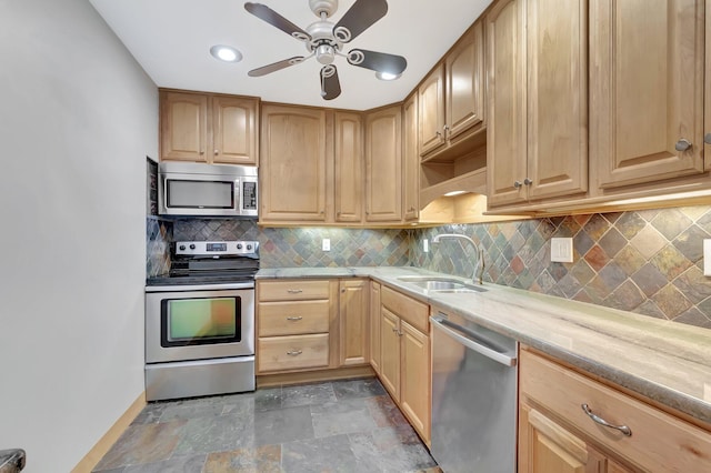 10095 45th Ter S Unit 443, Boynton Beach, FL 33436 - kitchen featuring appliances with stainless steel finishes, a sink, a ceiling fan, backsplash, and light brown cabinets