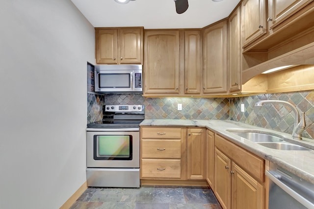 10095 45th Ter S Unit 443, Boynton Beach, FL 33436 - kitchen with appliances with stainless steel finishes, a sink, light countertops, and tasteful backsplash