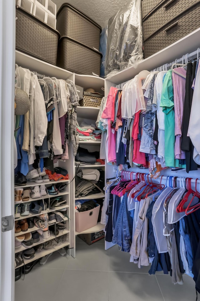 7779 Butera Plz, Delray Beach, FL 33446 - walk in closet featuring tile patterned floors