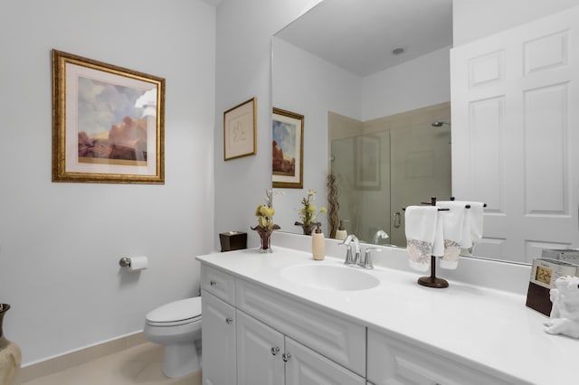 7779 Butera Plz, Delray Beach, FL 33446 - full bathroom featuring a shower stall, toilet, vanity, tile patterned flooring, and baseboards