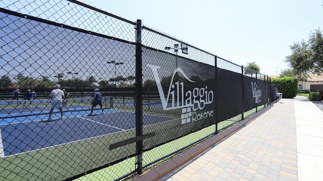 7779 Butera Plz, Delray Beach, FL 33446 - view of tennis court with fence