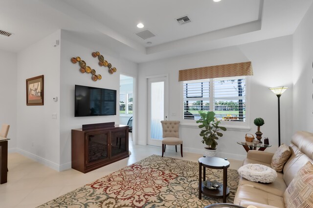 7779 Butera Plz, Delray Beach, FL 33446 - living area featuring plenty of natural light, a raised ceiling, recessed lighting, and baseboards
