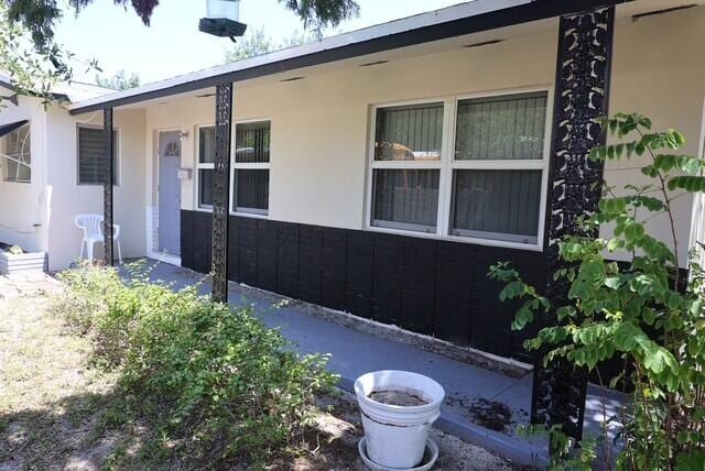 1454 NE 2nd Ct, Boca Raton, FL 33432 - view of side of property featuring stucco siding