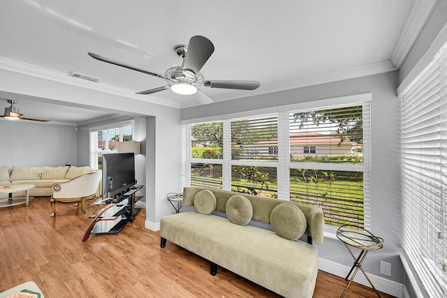 4585 NW 3rd St Unit D, Delray Beach, FL 33445 - sitting room with ceiling fan, baseboards, light wood finished floors, and ornamental molding