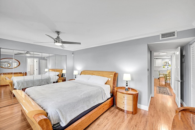 4585 NW 3rd St Unit D, Delray Beach, FL 33445 - bedroom with light wood-style floors, ornamental molding, baseboards, and a ceiling fan