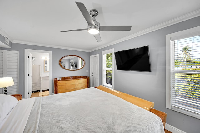 4585 NW 3rd St Unit D, Delray Beach, FL 33445 - bedroom with ornamental molding, baseboards, a ceiling fan, and ensuite bath