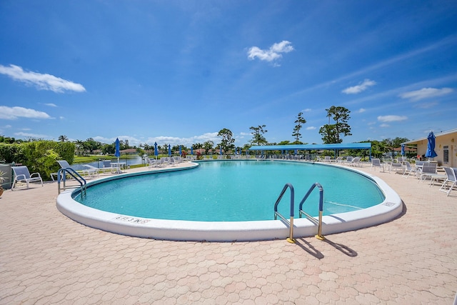 4585 NW 3rd St Unit D, Delray Beach, FL 33445 - community pool with a patio