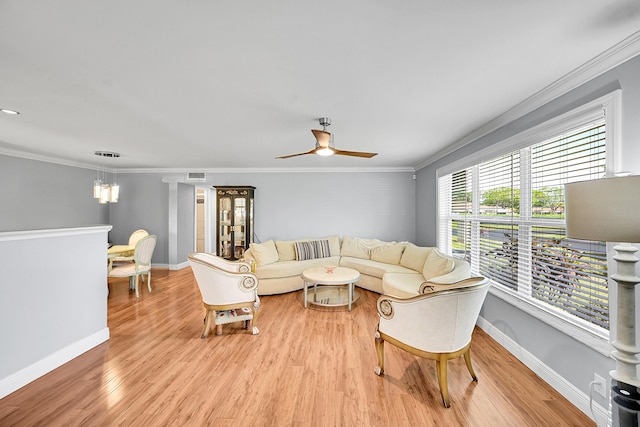 4585 NW 3rd St Unit D, Delray Beach, FL 33445 - living area featuring crown molding, light wood-type flooring, a ceiling fan, and baseboards