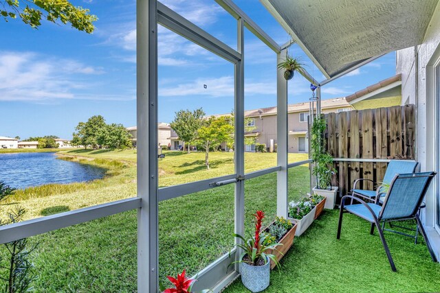 2556 Marshfield Ct, Port Saint Lucie, FL 34953 - sunroom featuring a water view and plenty of natural light