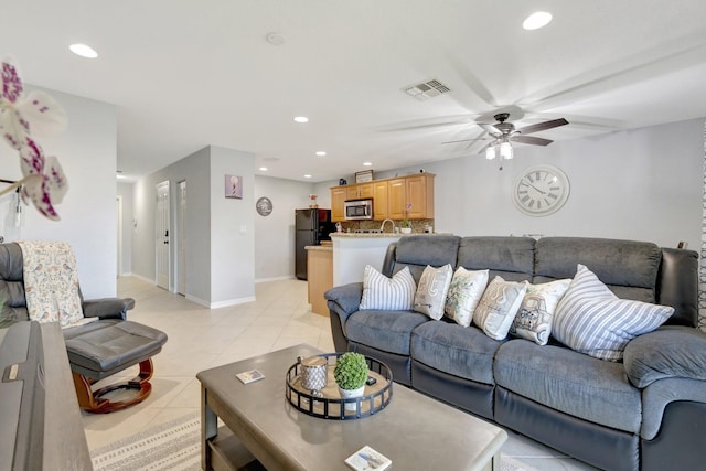 2556 Marshfield Ct, Port Saint Lucie, FL 34953 - living room with ceiling fan, light tile patterned floors, baseboards, and recessed lighting