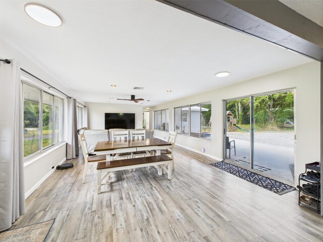 living room featuring wood finished floors, baseboards, recessed lighting, and ceiling fan