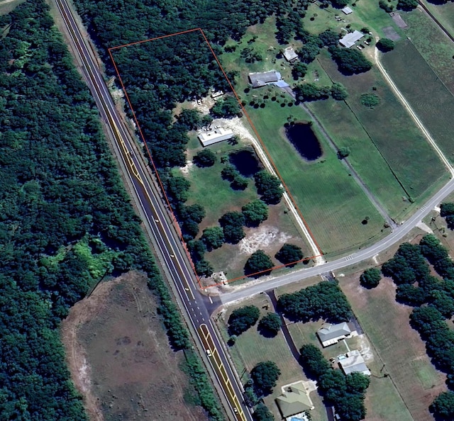 aerial view of property's location featuring property boundaries highlighted