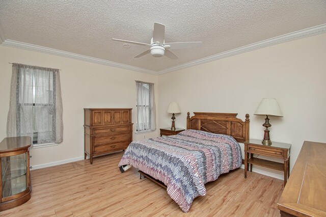 5123 Adams Rd, Delray Beach, FL 33484 - bedroom with light wood-style floors, crown molding, a textured ceiling, baseboards, and a ceiling fan