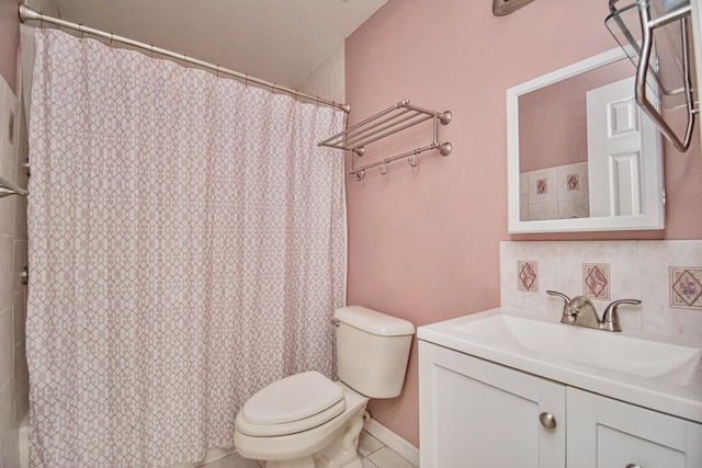 5123 Adams Rd, Delray Beach, FL 33484 - bathroom with toilet, vanity, backsplash, a shower with curtain, and tile patterned flooring