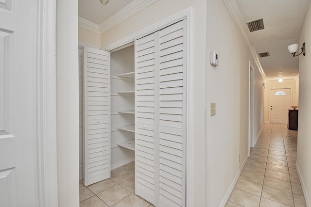 5123 Adams Rd, Delray Beach, FL 33484 - hall featuring light tile patterned floors, crown molding, and baseboards