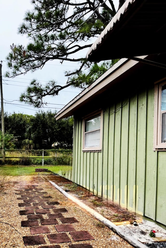5123 Adams Rd, Delray Beach, FL 33484 - view of side of property featuring board and batten siding