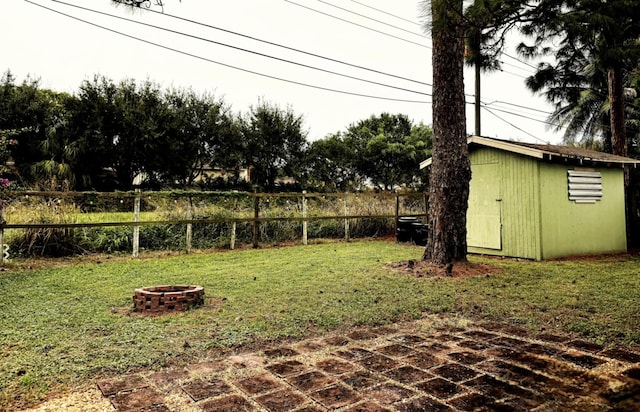 5123 Adams Rd, Delray Beach, FL 33484 - view of yard featuring an outdoor fire pit