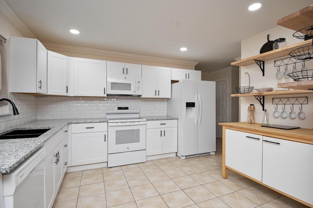 5123 Adams Rd, Delray Beach, FL 33484 - kitchen featuring white appliances, a sink, open shelves, ornamental molding, and tasteful backsplash