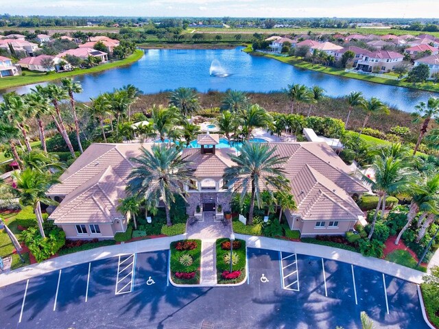 aerial perspective of suburban area with a large body of water