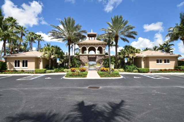 view of property with uncovered parking