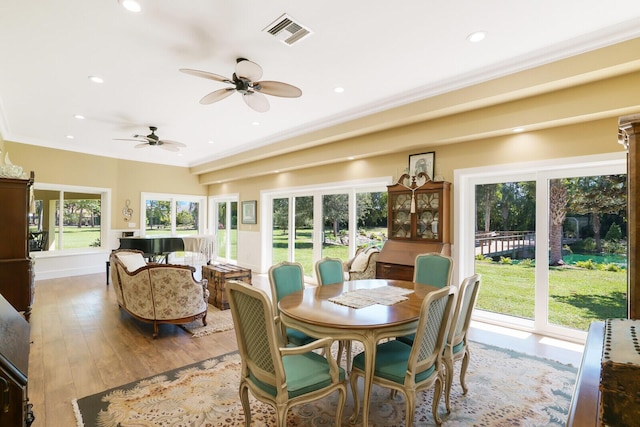 6624 Dillman Rd, West Palm Beach, FL 33413 - dining area featuring crown molding, recessed lighting, plenty of natural light, a ceiling fan, and wood finished floors